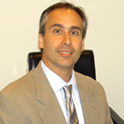 Dr. Lewis Carrarini